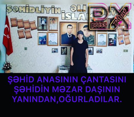 ŞƏHİD ANASININ ÇANTASINI ŞƏHİDİN MƏZAR DAŞININ YANINDAN OĞURLADILAR
